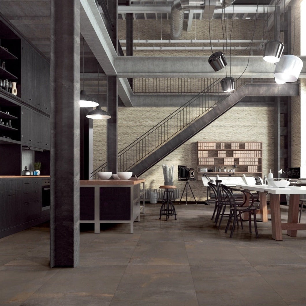 Abita Bronzo metallic style matte porcelain tile for floor and wall made in Italy. Installed in room.