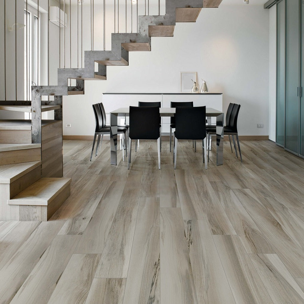 Amazzonia Grigio matte porcelain tile with a grey wood design, for floors and walls. Made in Italy, installed on floor.