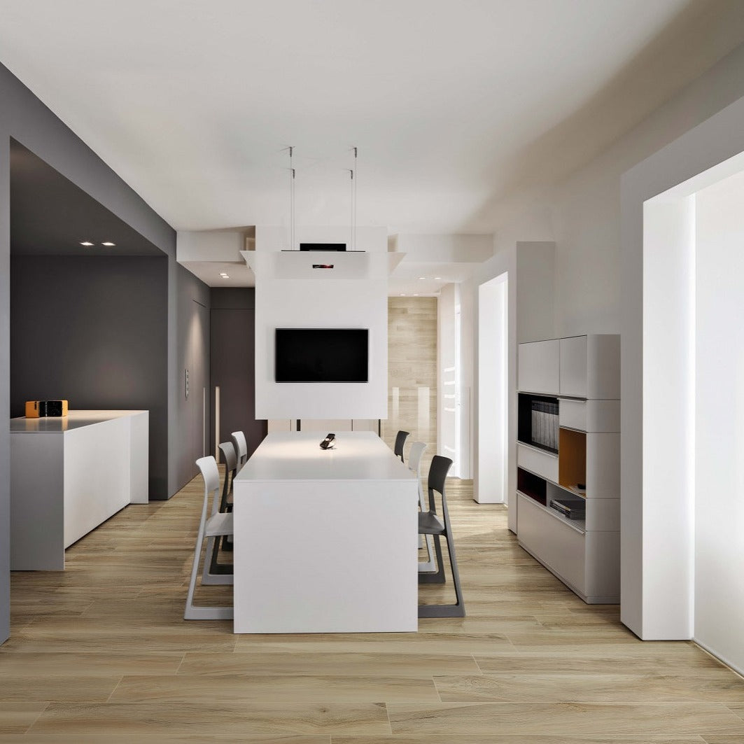 Amazzonia Miele matte porcelain tile with a beige wood design, for floors and walls. Made in Italy, installed in a room.