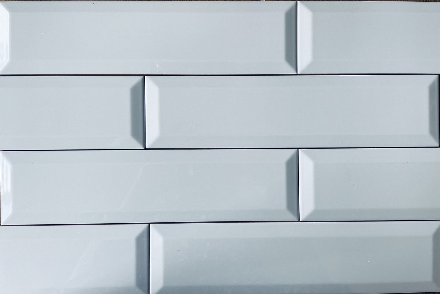 Biselado Gris grey glossy ceramic subway tile with a beveled edge, for walls. Made in Spain, in a 3x12" size.