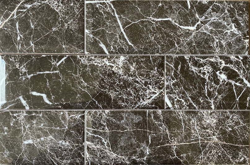 Marquina black marble style ceramic beveled subway tile, for walls. Made in Spain, in a 4x12" size.