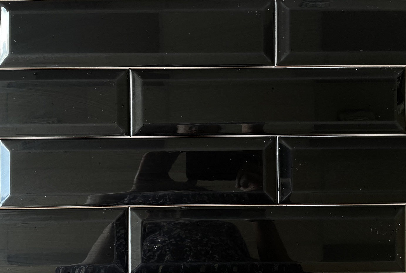 Biselado Negro black glossy ceramic subway tile with a beveled edge, for walls. Made in Spain, in a 3x12" size.