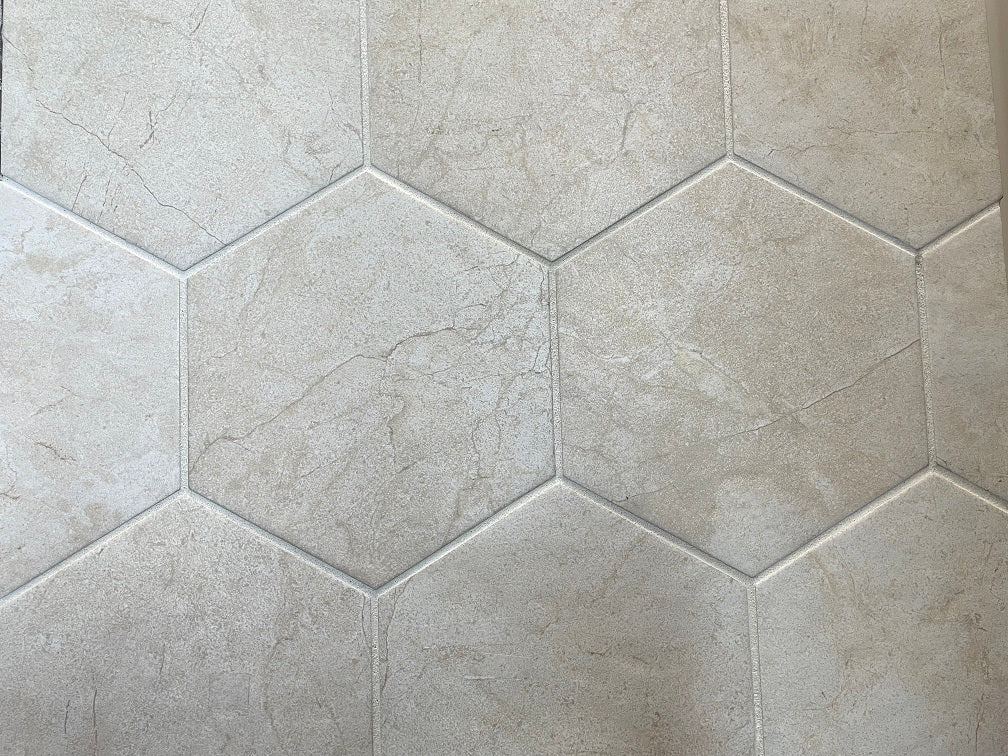Bistrot matte porcelain tile with an ivory design, for floors and walls. Made in Italy, in a 7" hexagon size.