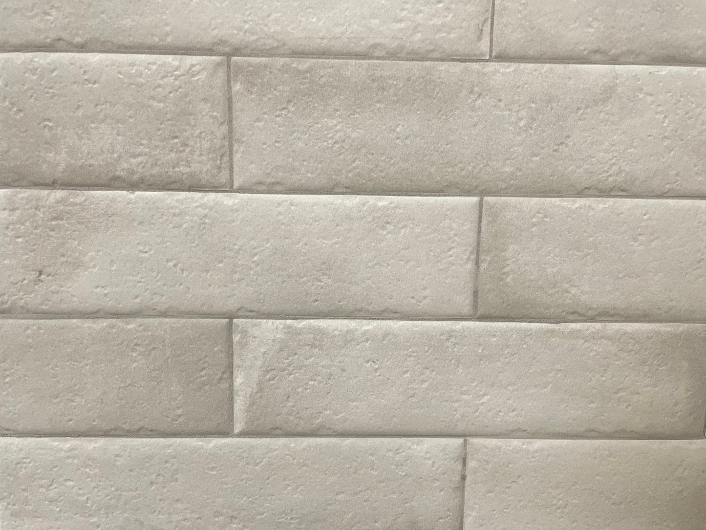 Brickell Blanco matte ceramic subway tile with an aged white style, for walls and backsplashes. In a 3x12" size.