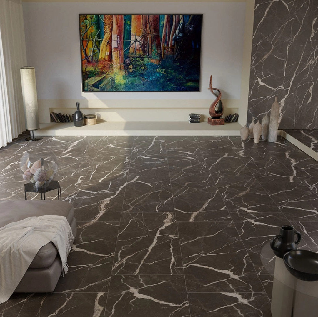 Calacatta Cenerino porcelain tile with black marble design, for floors and walls. Made in Italy, installed in a room.