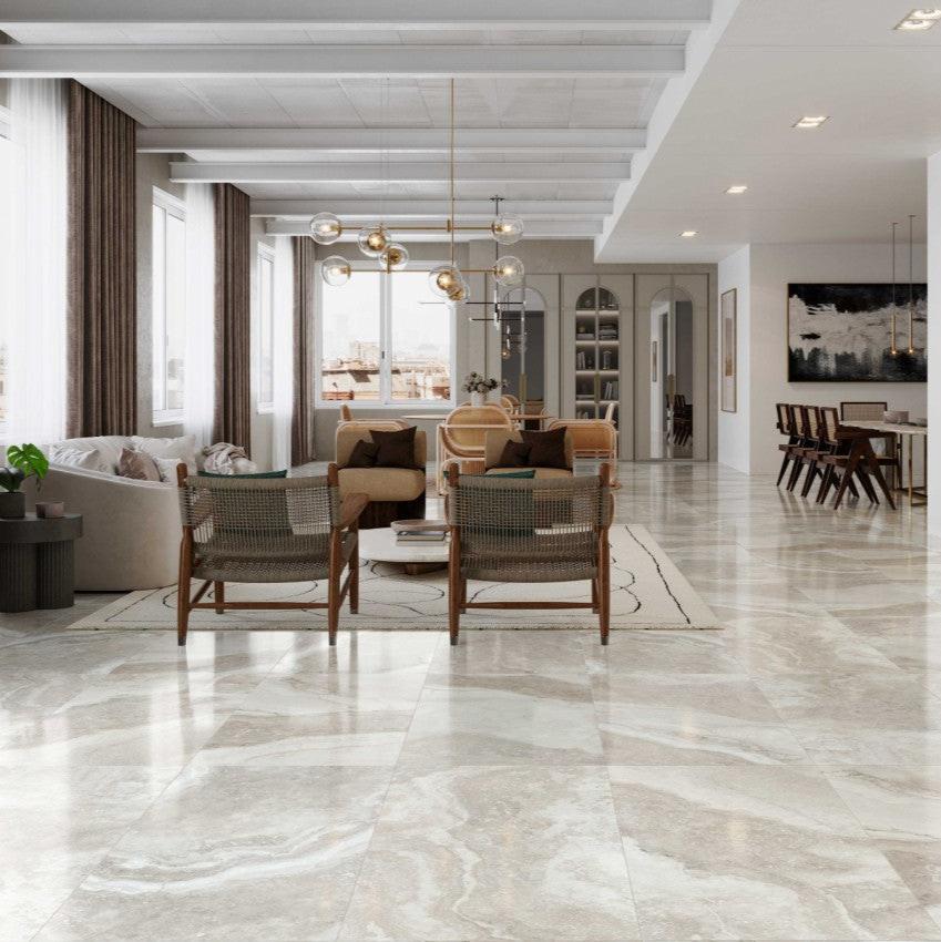 Caracalla Bianco porcelain tile with a travertine design, for floors and walls. Made in Spain, installed in a room.