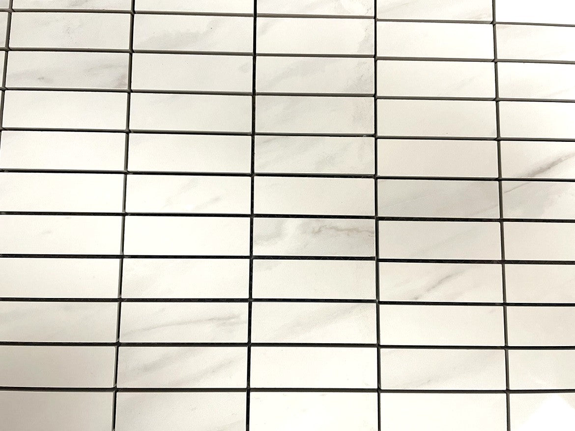 Carrara Striscia polished porcelain mosaic with a white marble design, for floors and walls. In a 1x3" size.