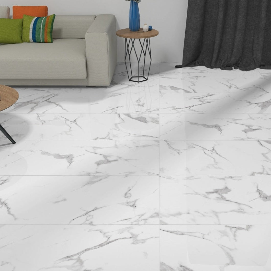 Casablanca porcelain tile with a white marble design, for floors and walls. Made in Spain, installed on the floor.