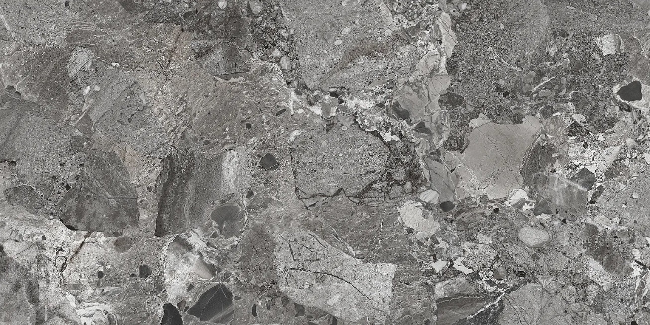 Ceppo Antracite polished porcelain tile with a rock/pebble design, for floors and walls. In a 24x48" size.