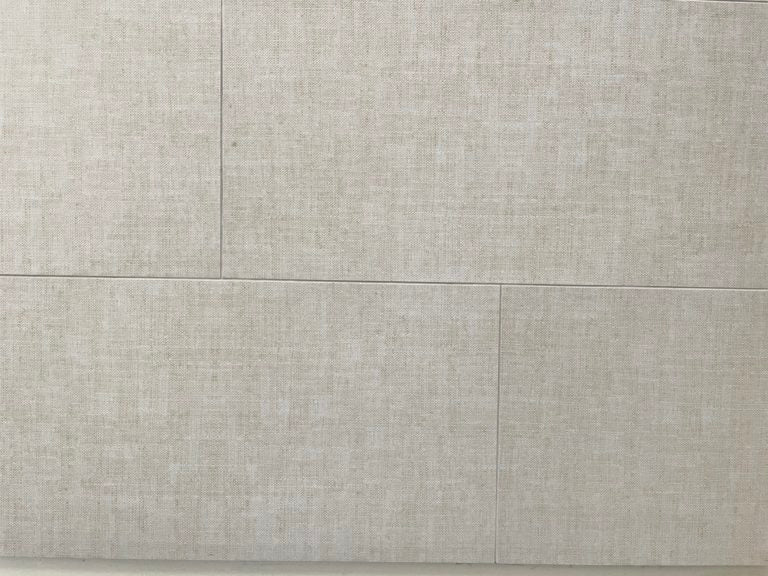 Fabric Beige matte finish porcelain mosaic with a light beige fabric effect, for floors and walls. In a 12x24" size.