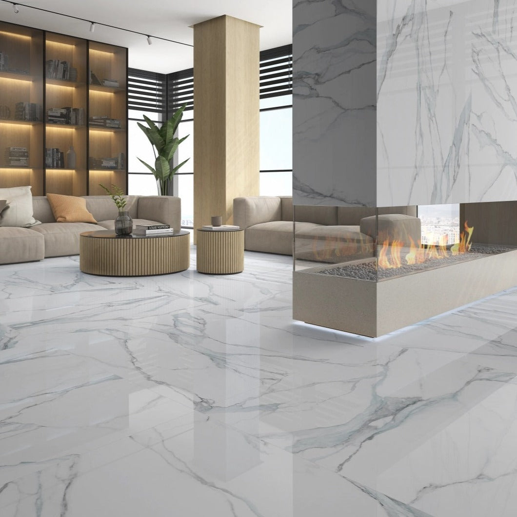 Fantasy Acqua polished porcelain tile with a white and blue marble design, for floors and walls. Installed in a room.