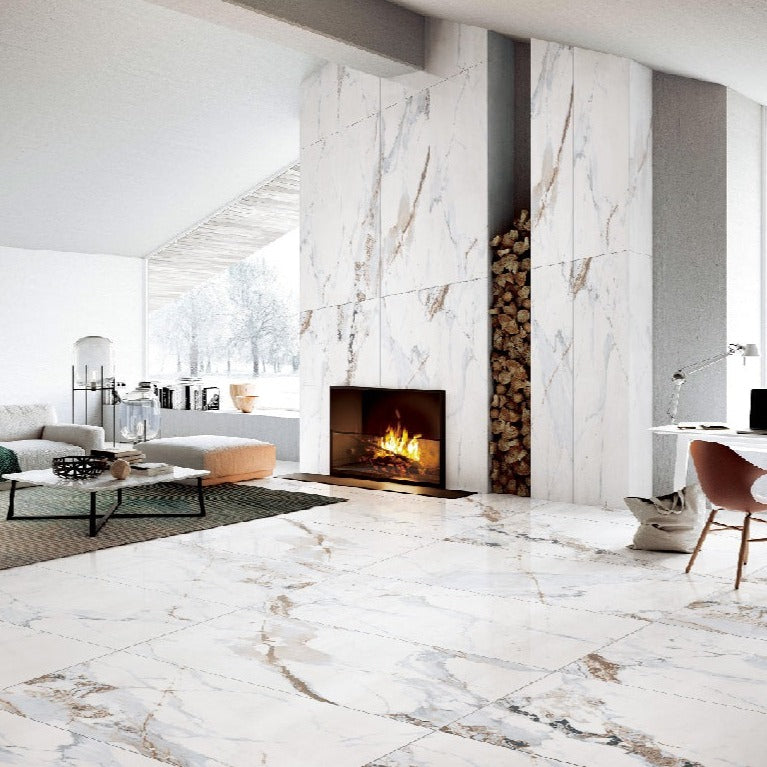 Gder Gold polished porcelain tile with a white and brown marble style, for floors and walls. Installed in a room.