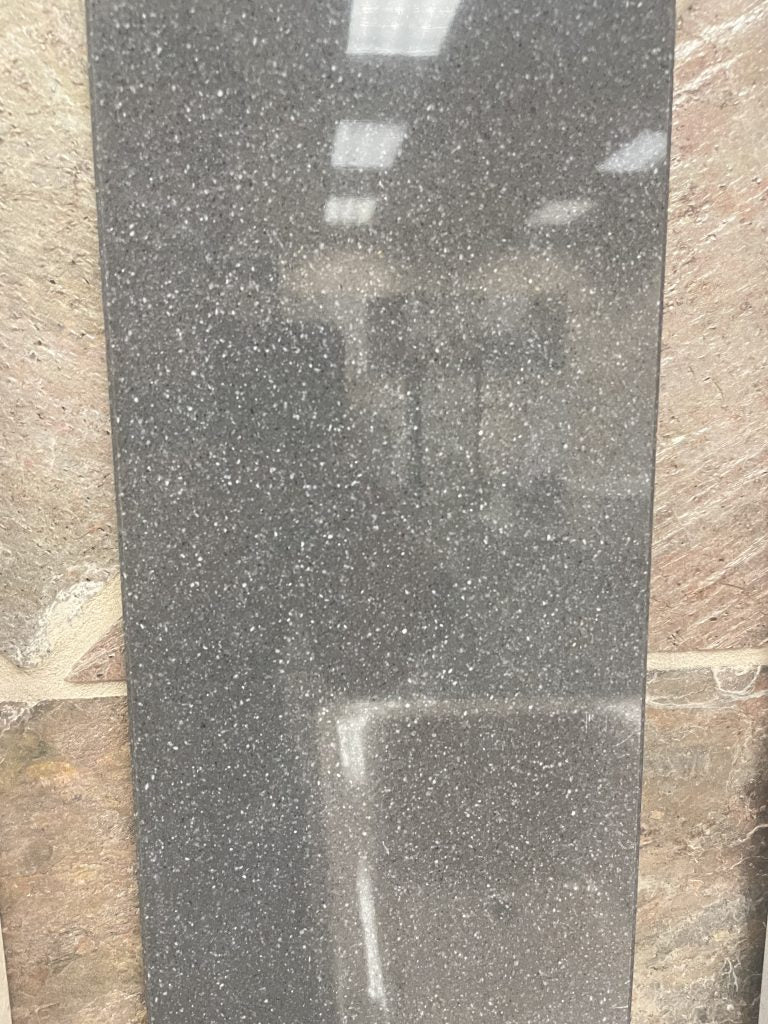 Lava Grey quartz shower arch in a 6x76" size.