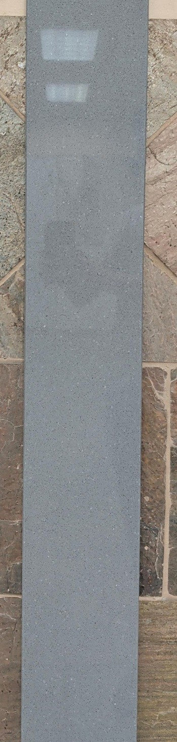 Lava Grey quartz shower arch in a 6x76" size.