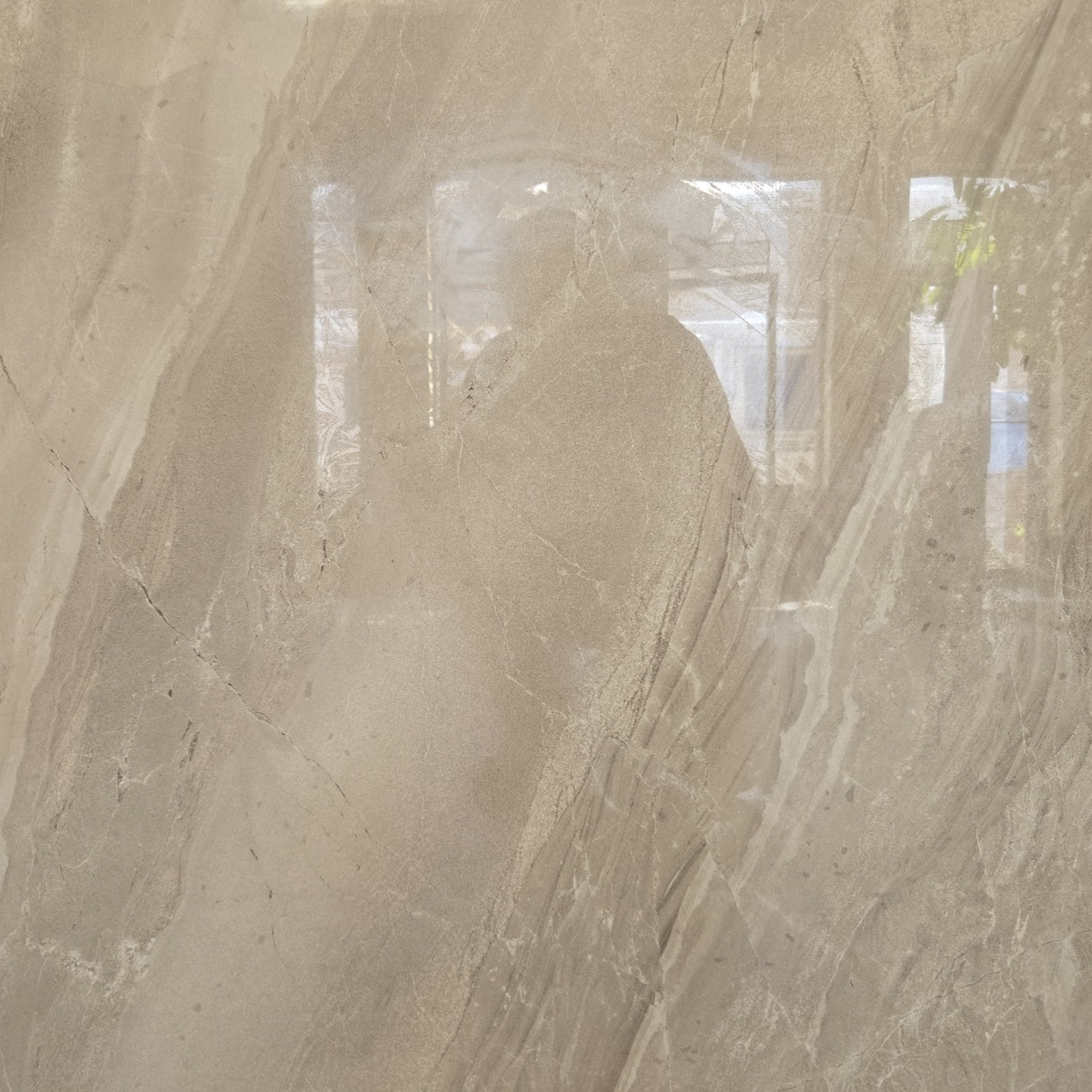 Lazio Beige polished porcelain tile with a stone design, for floors and walls. In a 32x32" size.