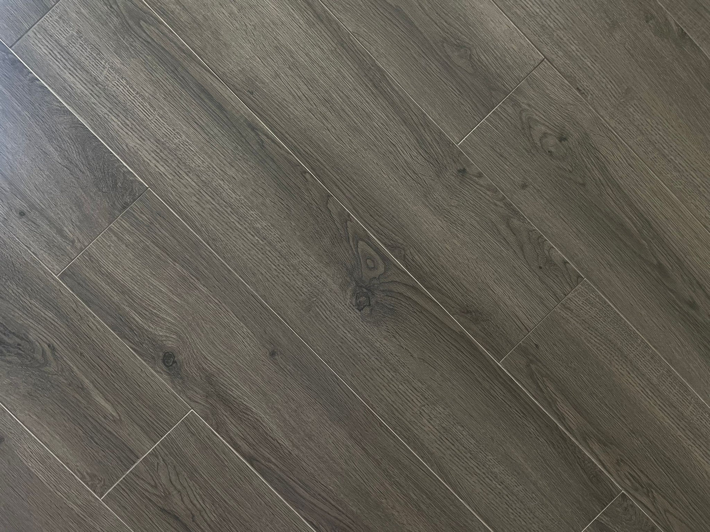 Loft Serenity matte porcelain tile with a taupe wood design, for floors and walls. In a 6x36" size.
