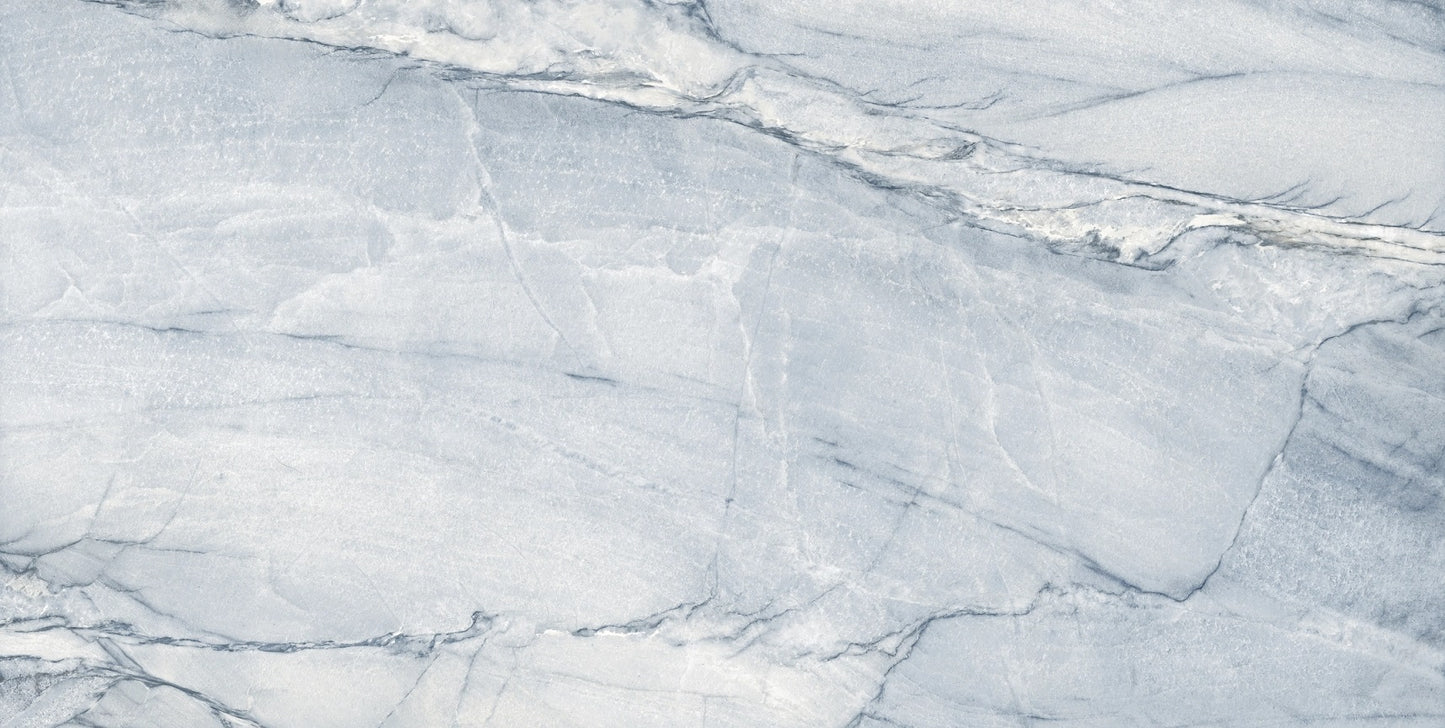 Macauba Blue polished porcelain tile with a marble design, for floors and walls. Made in Spain, in a 24x48" size.