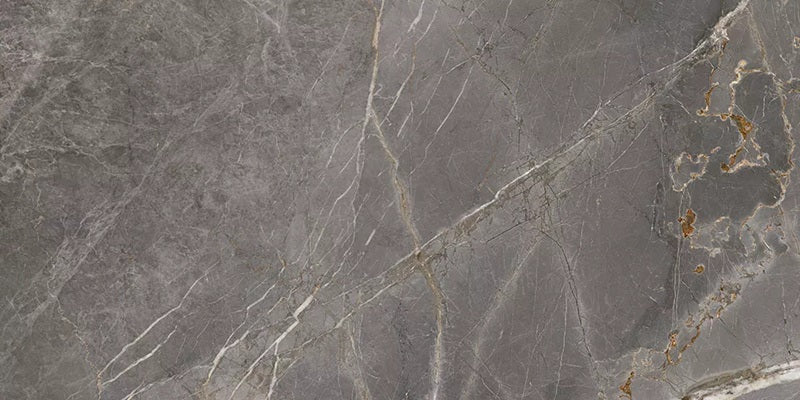 Marmi Grafito porcelain tile with a dark grey marble design, for floors and walls. Made in Spain, in a 24x48" size.