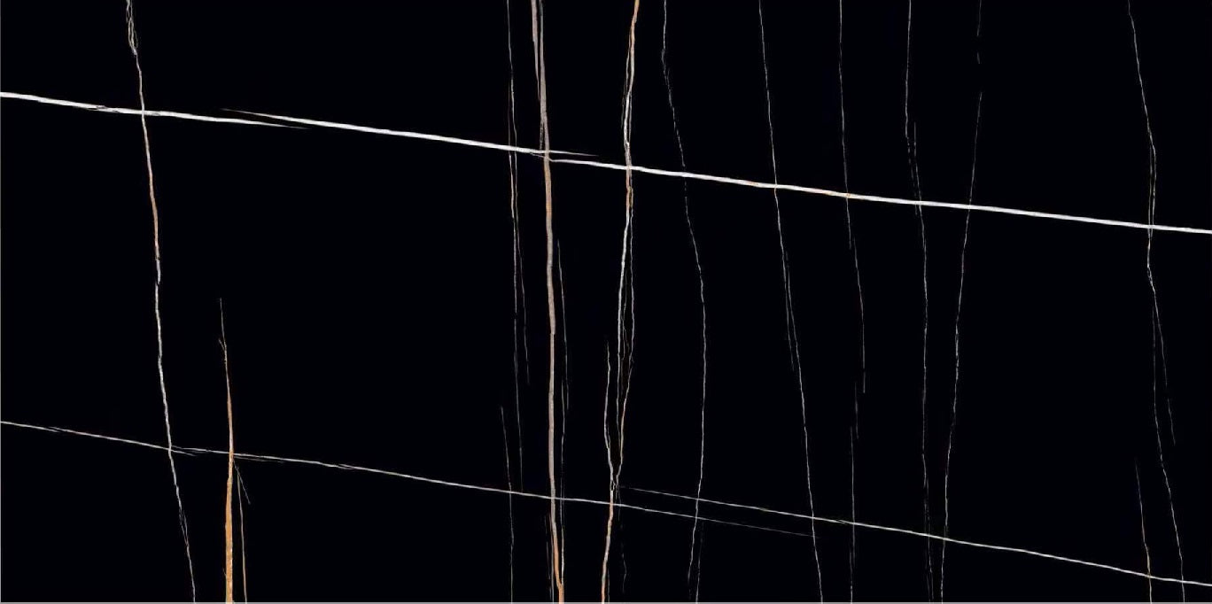 Marmo Avventuroso polished porcelain tile with a black, gold, and white design, for floors and walls. In a 24x48" size.