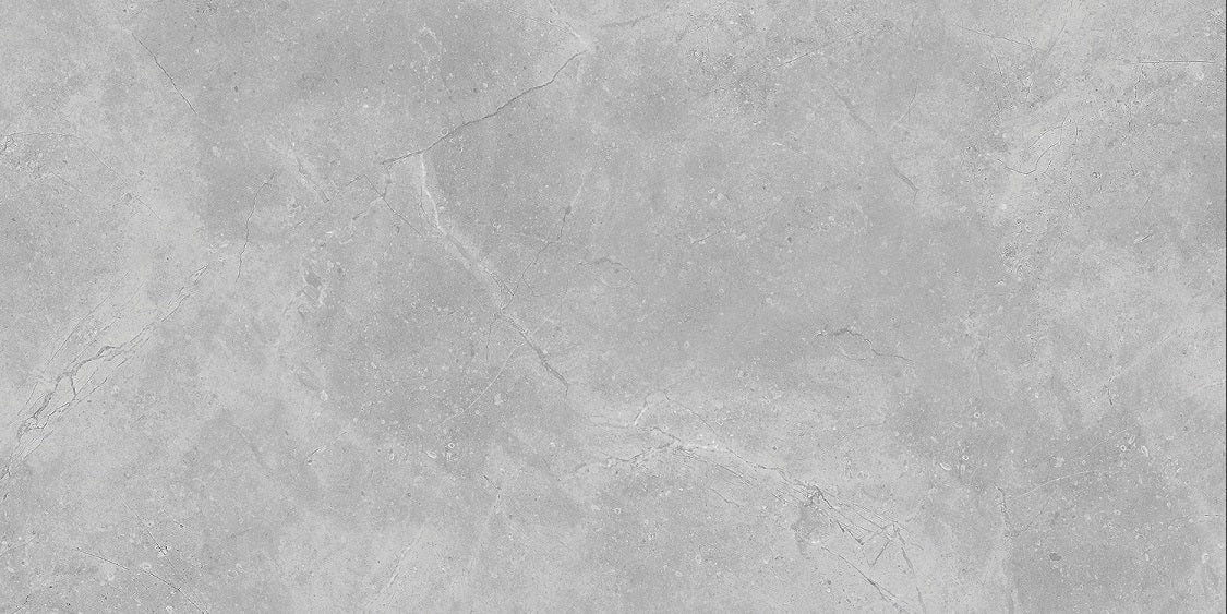 Marmo Capriccioso polished porcelain tile with a grey stone design, for floors and walls. In a 24x48" size.