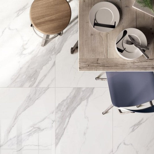 Marmo Commovente polished porcelain tile with a white marble design, for floors and walls. Installed in a room.