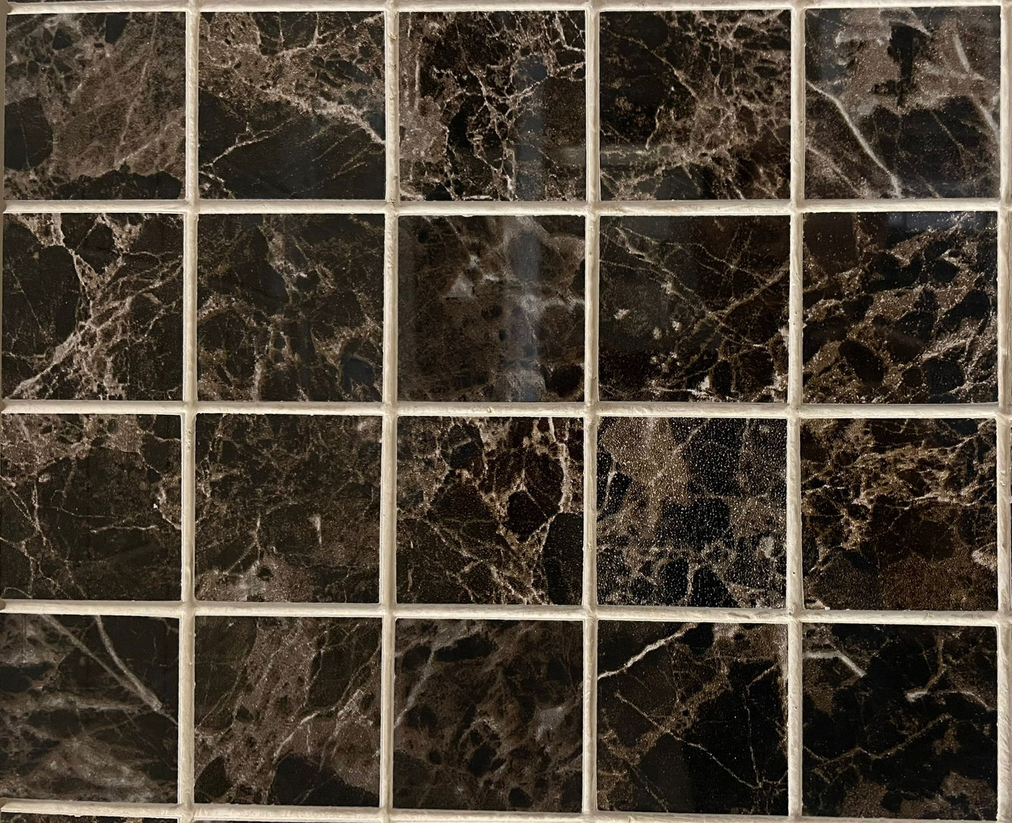 Dark Emperador polished porcelain mosaic with a brown marble style, for floors and walls. In a 2x2" size.