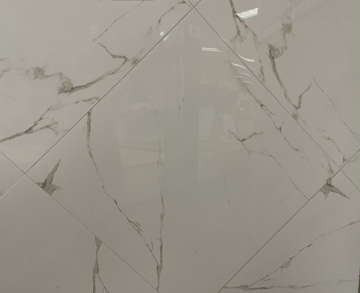 Marmo Elisabetta polished porcelain tile with a white marble style for floors and walls. In a 24x24" size.