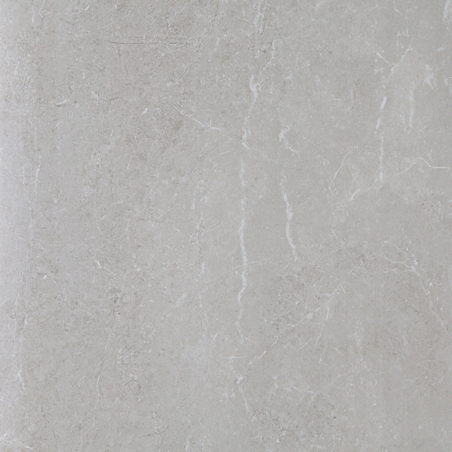 Kibal Gris glossy porcelain tile with a grey stone design, for floors and walls. Made in Spain, in a 24x24" size.