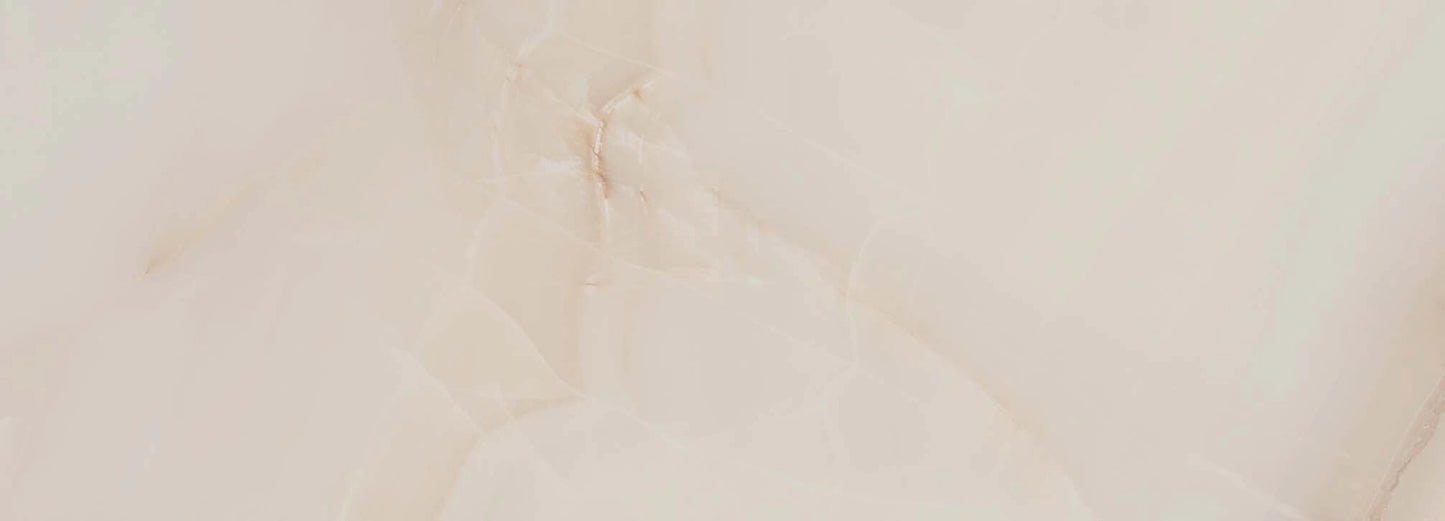 Mirage Warm glossy ceramic tile with a beige onyx design, for walls. Made in Spain, in a 10x28" size.