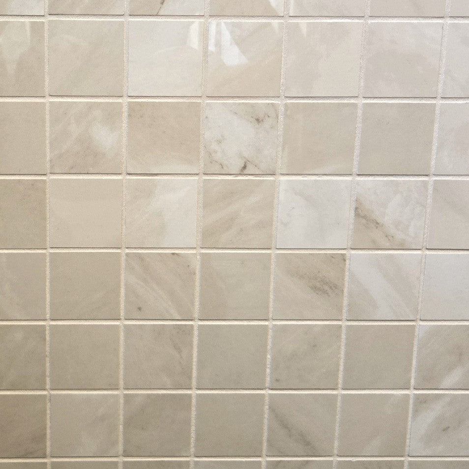 Morocco Fawn Beige porcelain mosaic with a beige marble style, for floors and walls. In a square shape.