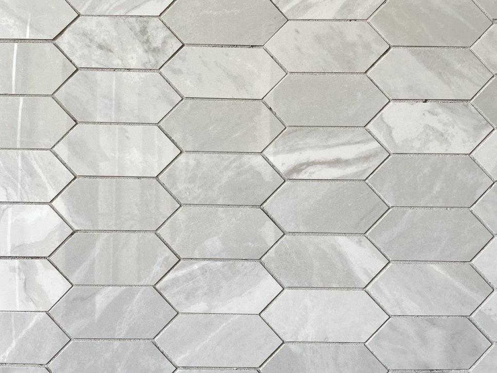 Morocco Pearl Grey porcelain mosaic with a light grey marble style, for floors and walls. In an elongated hexagon shape.