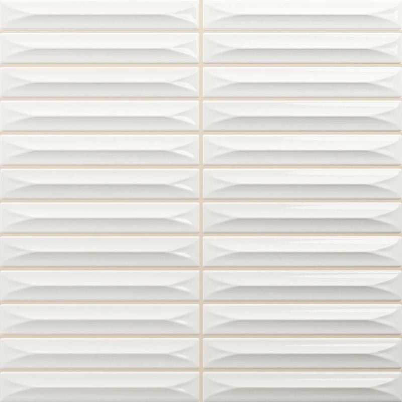 Nairobi White artisan style glossy ceramic subway tile with 0.6x4" arrow carvings. Made in Spain, in a 8x8" size.