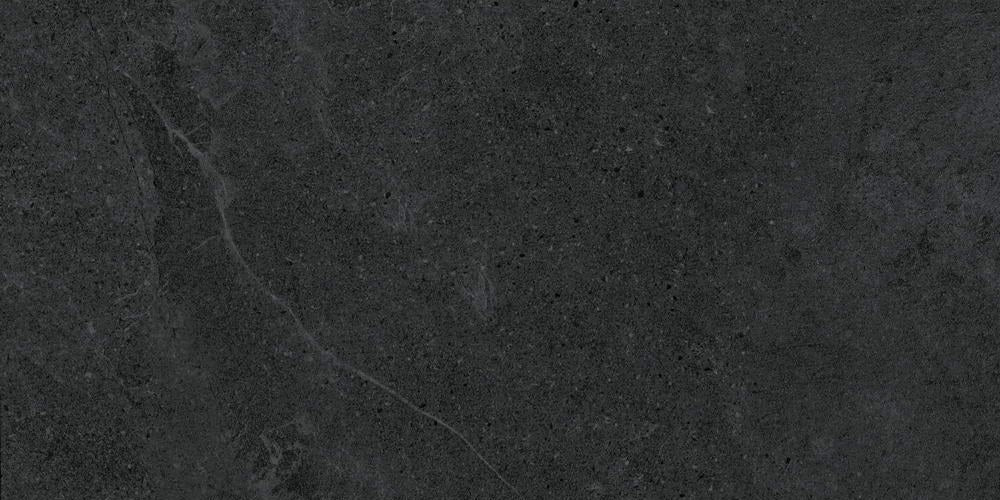 Nordic Charcoal matte porcelain tile with a dark grey/black stone look, for floors and walls. In a 24x48" size.