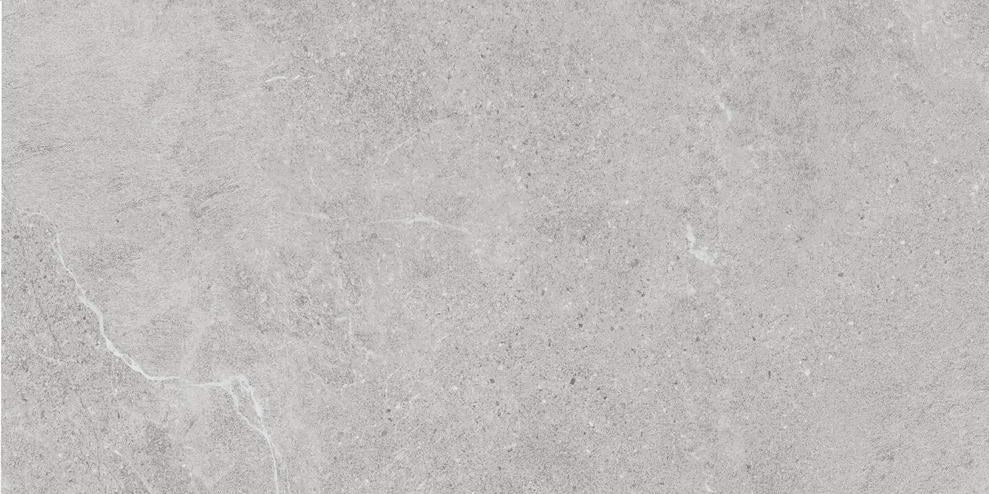 Nordic Grigio matte porcelain tile with a light grey stone look, for floors and walls. In a 24x48" size.