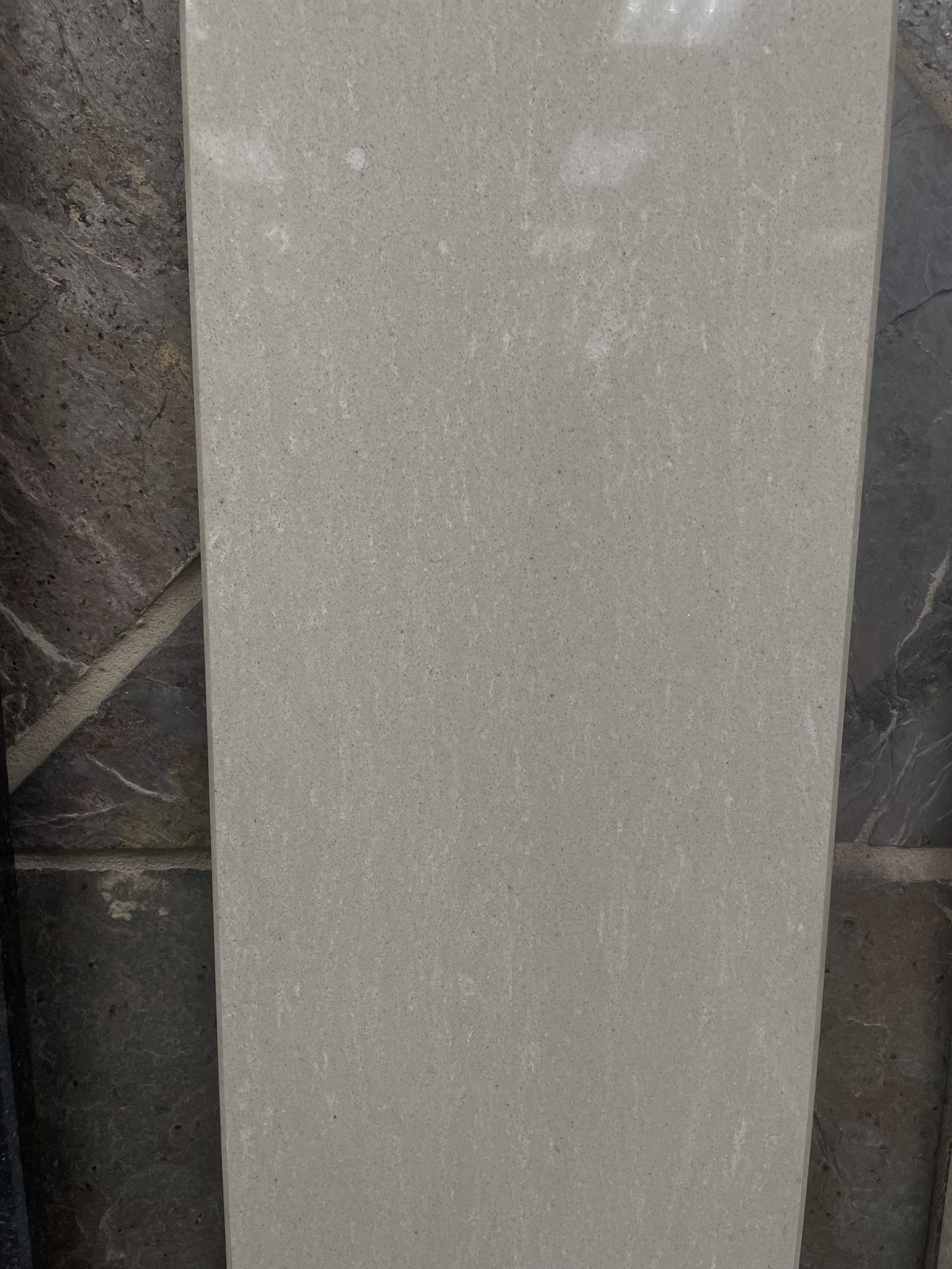 Nuvolato Dorato beige/taupe quartz shower arch in a 6x76" size.