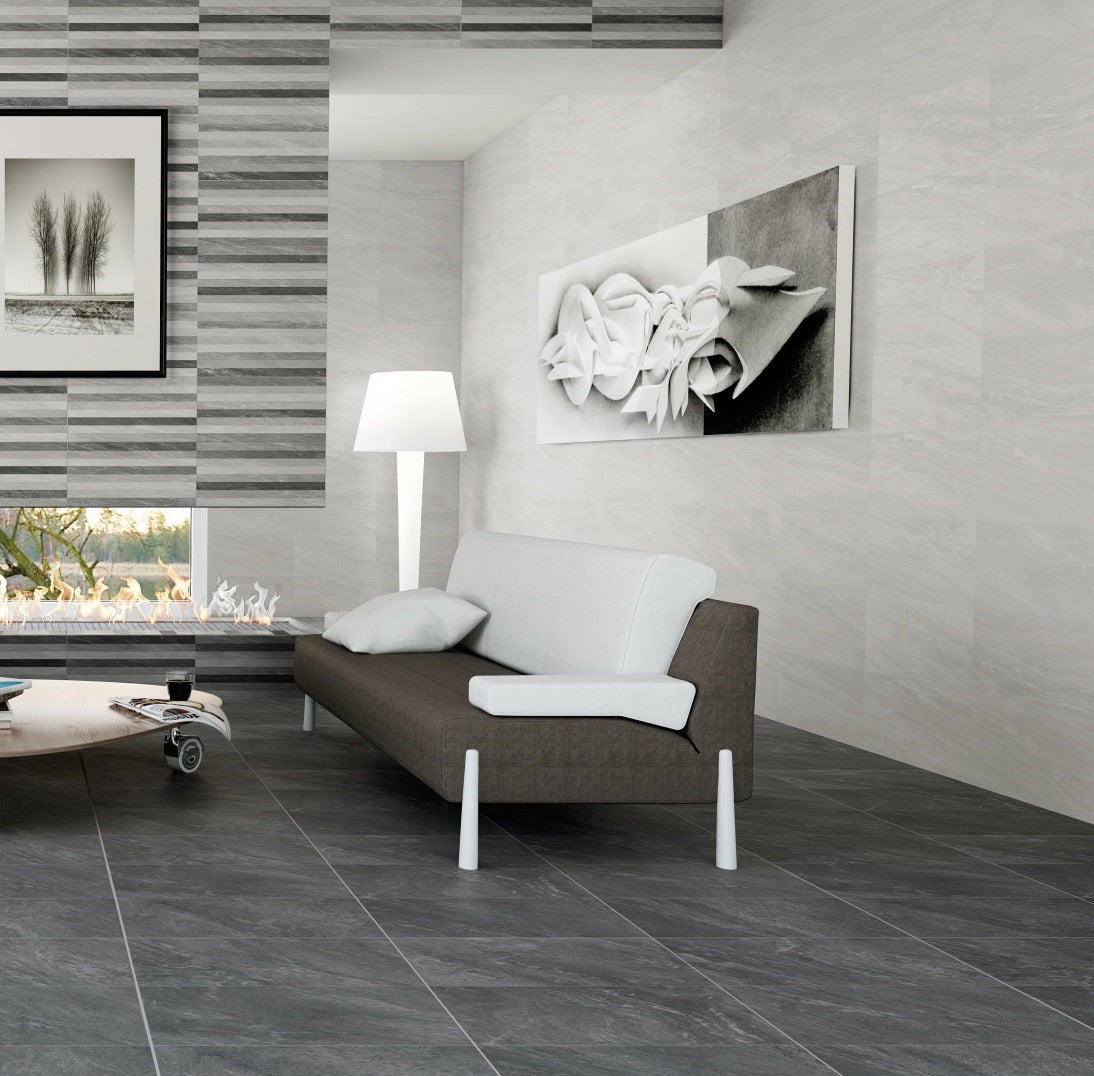 Safari matte porcelain tile with a grey stone design, for floors and walls. Made in Spain, installed in a room.