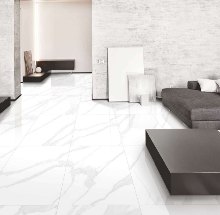 Satvario Royal matte (honed) porcelain tile with a white marble style, for floors and walls. Installed in a room.