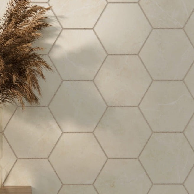 Morvedre Crema hexagon matte porcelain tile for floors and walls. Made in Spain, installed in a room.