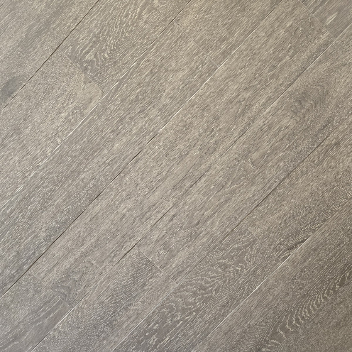 Summer Chalet matte porcelain tile with a grey wood design, for floors and walls. In a 6x36" size.