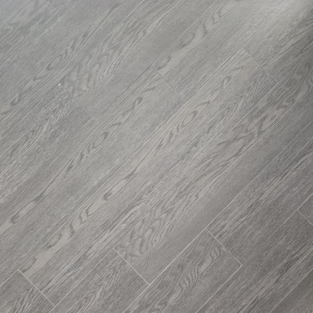 Summer Lodge matte porcelain tile with a taupe wood design, for floors and walls. In a 6x36" size.