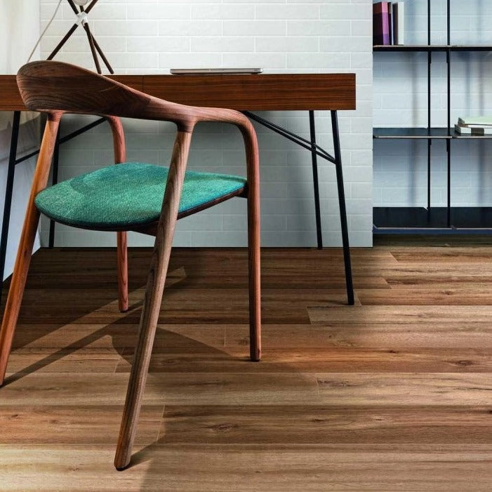 Travekheart Brown matte porcelain tile with a wood design, for floors and walls. Made in Italy, installed in a room.