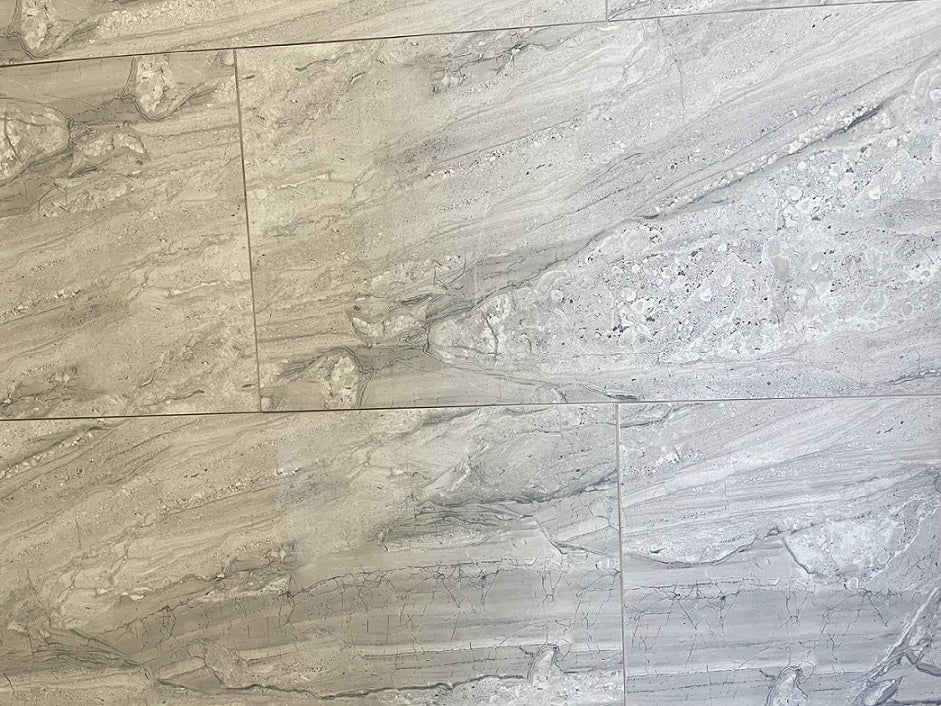 Tuscan Moon polished porcelain tile with a grey stone design, for floors and walls. In a 12x24" size.