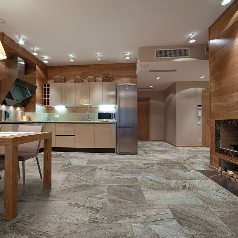 Utah Granite matte porcelain tile with a grey stone design, for floors and walls. Made in Italy, installed in a room.