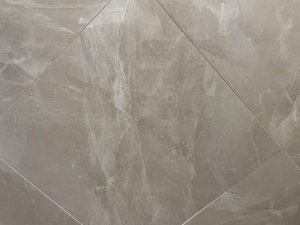 Valle Della Terra polished porcelain tile with a beige/brown colour, for floors and walls. In a 24x24" size.