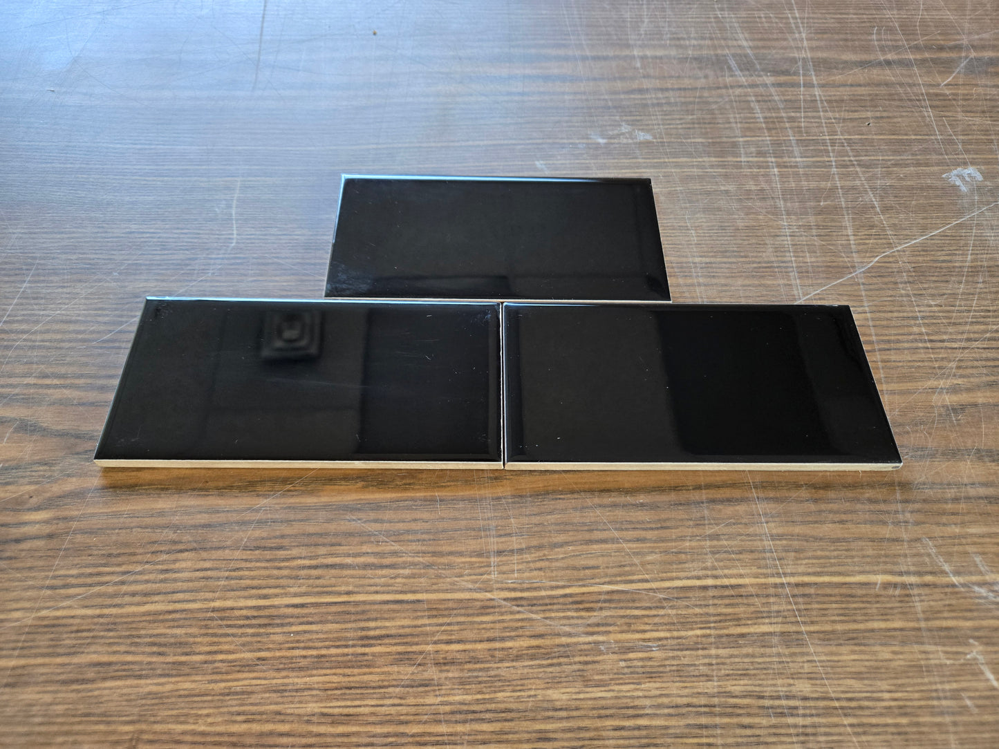 Vivid Black pure black glossy finish subway tile for backsplashes and feature walls. In a 3x6" size.