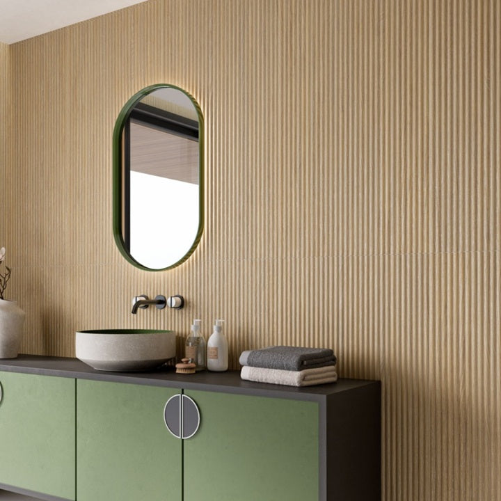 Woodlay Redwood matte porcelain tile with a fluted wood design, for feature walls. Made in Spain, installed on a wall.