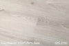 SPC Vinyl flooring in a natural white/off-white wood look in a 7x48" size, installed on a floor.