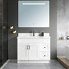 42 inch white MDF bathroom vanity with a white carrara quartz top, a chrome faucet, and black handles.