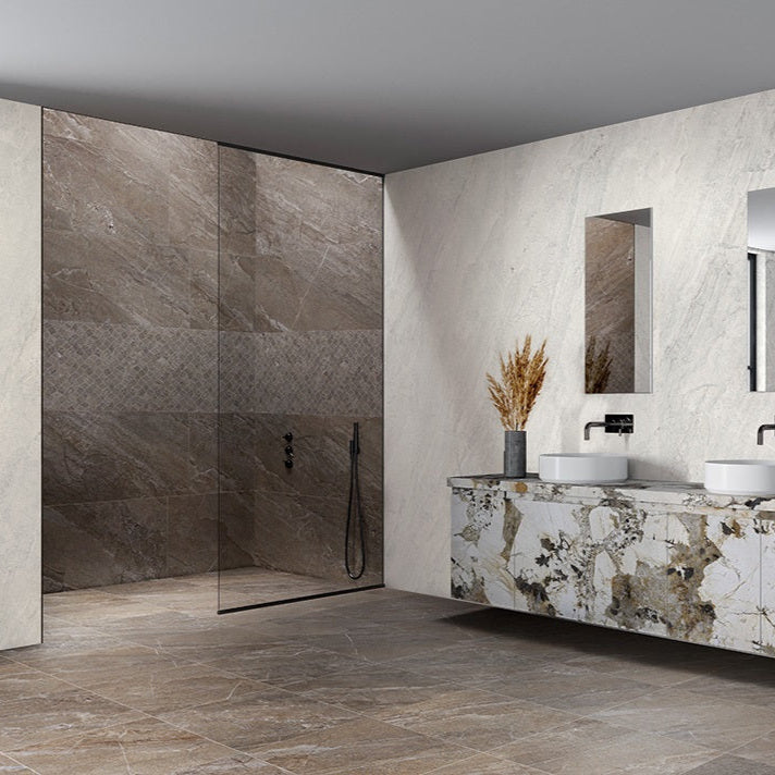 Agathos Multicolor matte porcelain tile with a stone design, for floors and walls. Made in Italy, installed in a room.