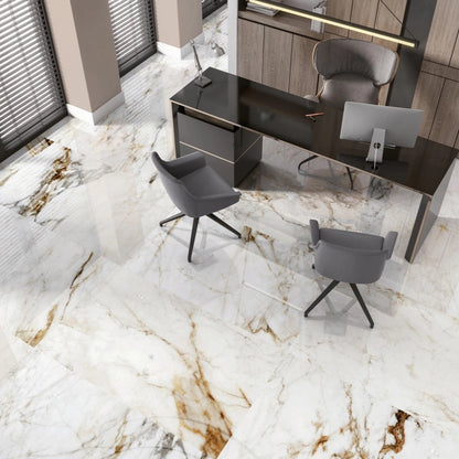 Barnaby porcelain tile with a white, gold, and silver marble design, for floors and walls. Installed in a room.